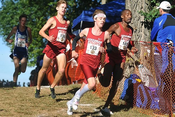 Arkansas' Alex George (133) runs ahead of Frankline Tonui (141) and Christian Heymsfield (136) during the Chile Pepper Cross Country Festival on Saturday, Oct. 3, 2015, in Fayetteville.
