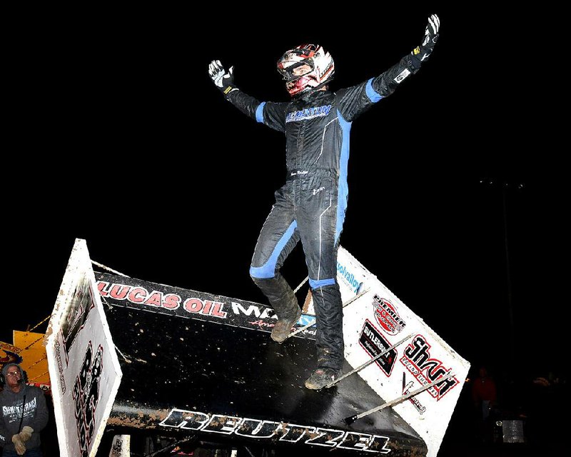 Aaron Reutzel of Clute, Texas, celebrates after winning Thursday night’s Sprint Screamer at I-30 Speedway in Little Rock. It was Reutzel’s 12th victory of the season.