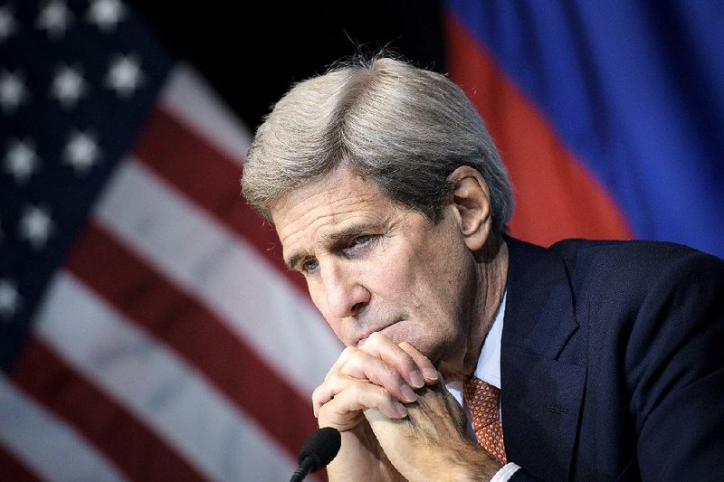 Secretary of State John Kerry said Friday in Vienna that the U.S. was intensifying a “two-pronged” effort to end the Syrian conflict — diplomatically and militarily.
