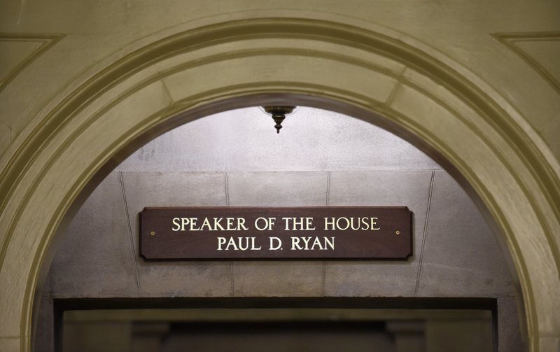 The new sign for new House Speaker Paul Ryan of Wis., is seen above the hallway leading to Ryan's office on Capitol Hill in Washington, Friday, Oct. 30, 2015. Ryan became the 54th speaker of the House on Thursday in a day of high political theater, a young new leader for a fractured Congress, charged with healing Republican divides and quieting the chaos of Capitol Hill.  