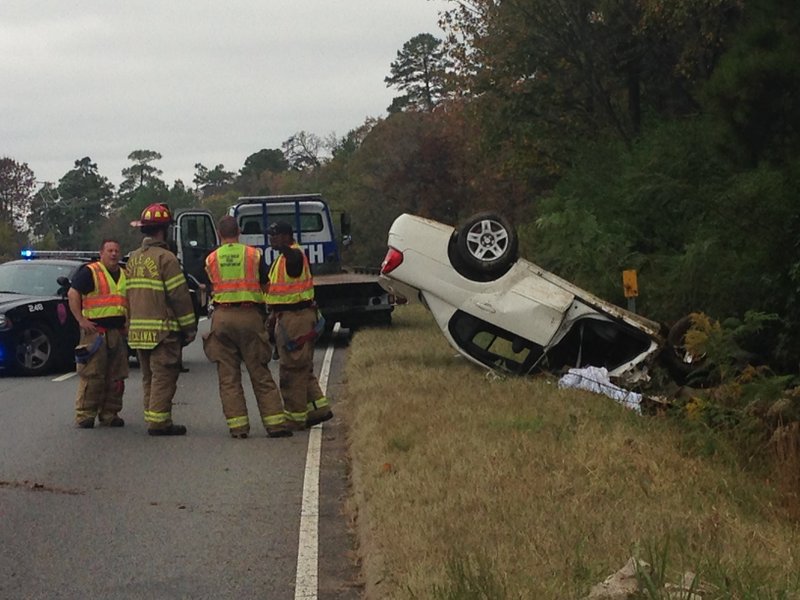 PHOTOS Car overturns in Little Rock; man hospitalized