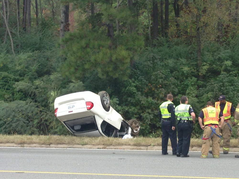 PHOTOS Car overturns in Little Rock; man hospitalized