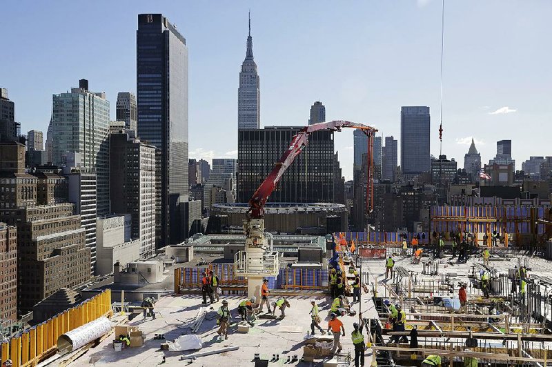 Construction continues on the building known as 3 Manhattan West in New York in October. U.S. construction spending rose 0.6 percent in September, the Commerce Department said Monday.
