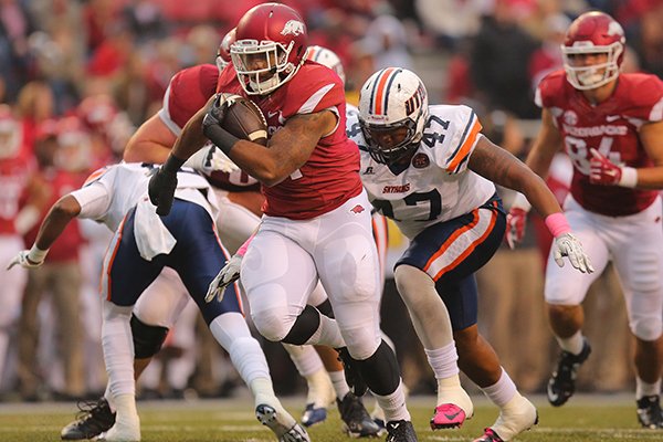Arkansas running back Kody Walker carries the ball during a game against Tennessee-Martin on Saturday, Oct. 31, 2015, at Razorback Stadium in Fayetteville. 
