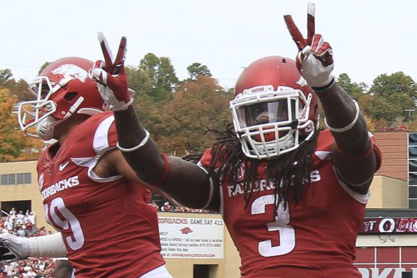 Arkansas running back Alex Collins celebrates after scoring a touchdown in the third quarter of a game against Auburn on Saturday, Oct. 24, 2015, at Razorback Stadium in Fayetteville. 