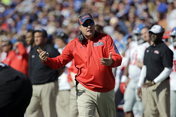 Mississippi head coach Hugh Freeze argues a call in the second half of an NCAA college football game against Memphis Saturday, Oct. 17, 2015, in Memphis, Tenn. Memphis upset Mississippi 37-24. (AP Photo/Mark Humphrey)