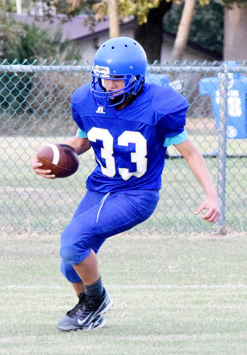 Photo by Mike Eckels Roger Hernandez (Decatur #33) crosses into the end zone for his first of two touchdowns during the Oct. 26 matchup with the Union Christian Eagles at Bulldog Stadium in Decatur.