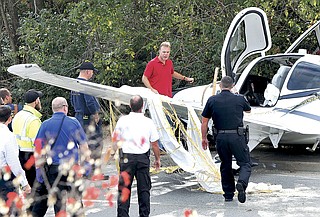 Small plane crash lands on Fayetteville street Northwest Arkansas