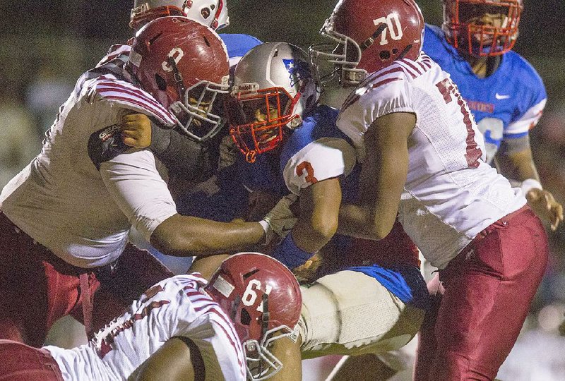 Pine Bluff’s defense, shown during a 42-0 victory over Little Rock Parkview on Oct. 2, has posted four shutouts in 6A-South Conference play and is allowing 7.8 points per game. 