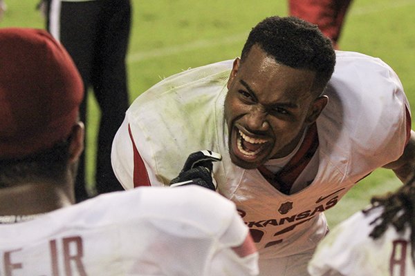 Rohan Gaines celebrates with teammates following Arkansas' 24-20 win over Tennessee on Saturday, Oct. 3, 2015, at Neyland Stadium in Knoxville, Tenn. 
