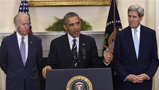 President Barack Obama, accompanied by Vice President Joe Biden and Secretary of State John Kerry, announces he's rejecting the Keystone XL pipeline because he does not believe it serves the national interest on Friday Nov. 6, 2015, in the Roosevelt Room of the White House in Washington.