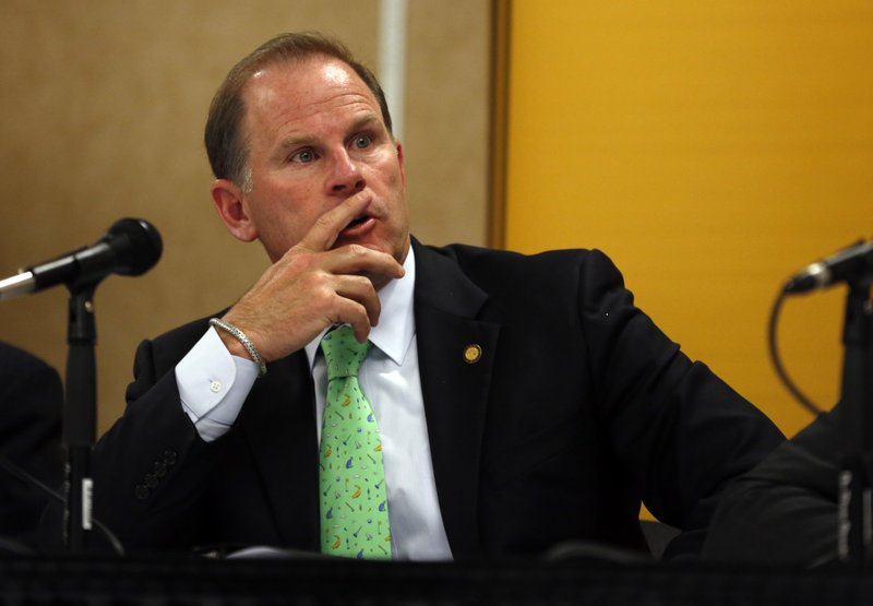 FILE - In this Friday, April 11, 2014, file photo, University of Missouri President Tim Wolfe participates in a news conference in Rolla, Mo. Missouri football players announced Saturday, Nov. 7, 2015, on Twitter that they will not participate in team activities until the university president is removed from office. The move aligns the team with campus groups who have been protesting the way Wolfe has dealt with issues of racial harassment during the school year. (AP Photo/Jeff Roberson, File)
