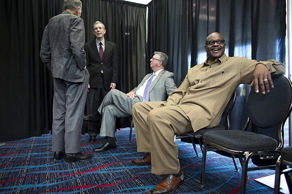 Southwest Conference Hall of Fame inductees Wayne Martin, Chuck Dicus and Bill Burnett talk together before their induction ceremony on Monday, Nov. 9, 2015, at the Statehouse Convention Center in Little Rock. 