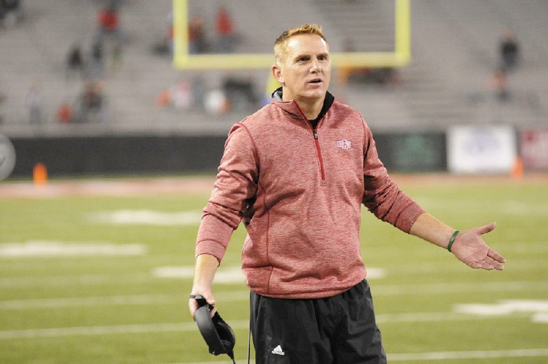 Special to the Arkansas Democrat Gazette/KAYLA MACOMBER - 10-31-15 - Arkansas State head coach Blake Anderson questions a call at Centennial Bank Stadium in Jonesboro, October 31, 2015.