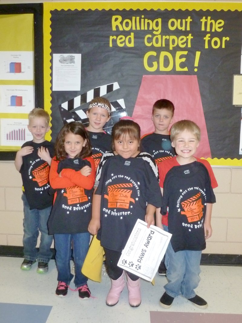 Submitted Photo Students chosen as &#8220;Pawsitive&#8221; and Wise Students of the Month for November were honored at a &#8220;Rise and Shine&#8221; assembly Nov. 2 at Glenn Duffy Elementary School. PAWS award winners, pictured above, are Olivia Powers of Bella Vista (left, front), Jacqueline Gonzalez of Gravette, Zach Carson of Gravette, Jason Downing of Sulphur Springs (left, back), Teagen Muldoon of Bella Vista and Randy Scates of Sulphur Springs.