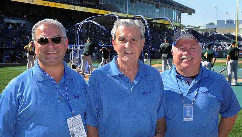 From left are Chris Vleisides, Royals owner David Glass and Don Free, pictured at Military Appreciation Day at Kauffman Stadium in Kansas City, Mo., in 2009.