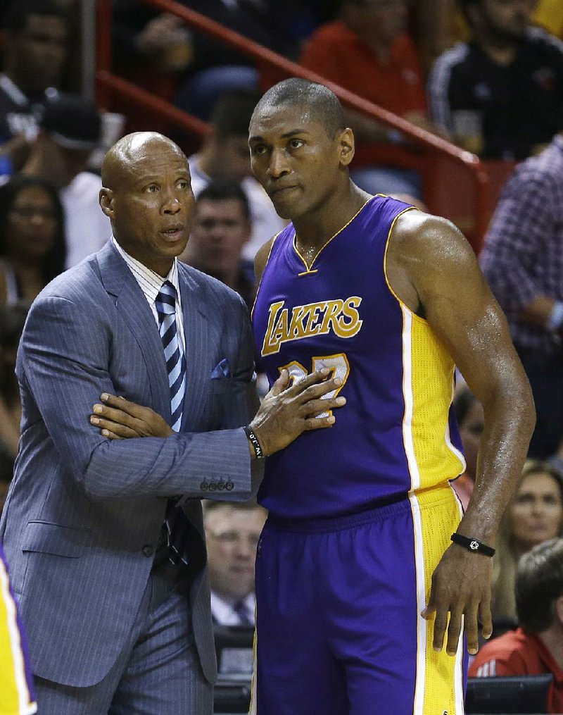 Los Angeles Lakers forward Metta World Peace (right), an avid wildlife enthusiast, used a marine reference to explain why the Lakers have been struggling. 