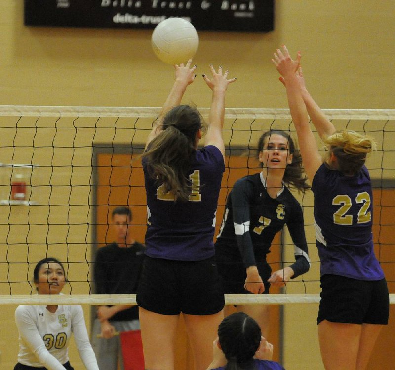 Shiloh Christian’s Reagan Robinson (center) was named the most valuable player in the Class 4A state tournament and led the Lady Saints to a 29-9-1 record including a 14-0 conference record and 12 consecutive victories to end the season.