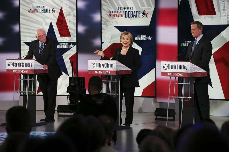 Democratic presidential candidates Bernie Sanders (from left), Hillary Rodham Clinton and Martin O’Malley face off Saturday night at Drake University in Des Moines, Iowa. 
