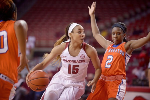 Arkansas' Kelsey Brooks (15) drives past Sam Houston State's Kamry Orr (2) on Sunday, Nov. 15, 2015, in Bud Walton Arena in Fayetteville.