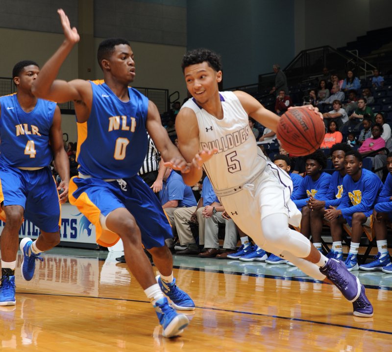 NWA Democrat-Gazette/ANDY SHUPE Payton Willis (5) of Fayetteville drives to the basket as Adrian Moore (0) of North Little Rock defends Saturday, Nov. 14, 2015, in Wildcat Arena at Har-Ber High School in Springdale. Visit nwadg.com/photos to see more photographs from the game.