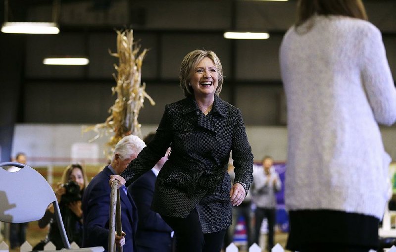 Democratic presidential candidate Hillary Rodham Clinton walks onstage before speaking at the Central Iowa Democrats Fall Barbecue on Sunday in Ames, Iowa.