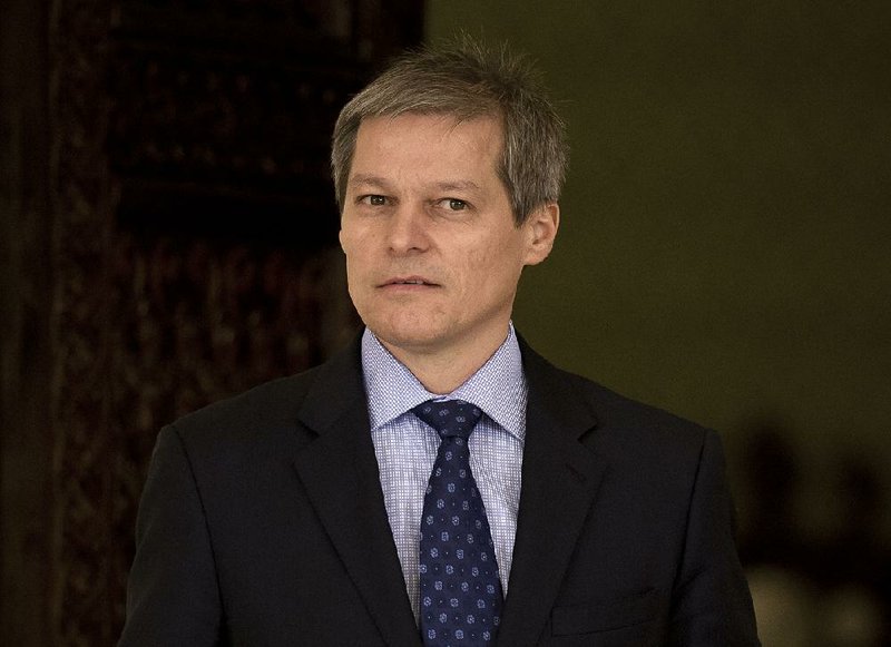 Dacian Ciolos, Romania’s prime minister-designate, arrives to address journalists Sunday on his proposal to form the country’s first technocratic government.