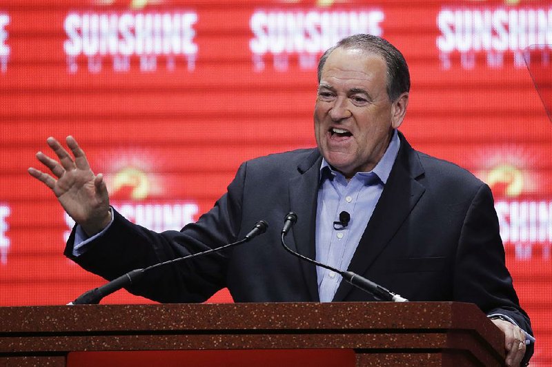 Former Arkansas Gov. Mike Huckabee addresses the Sunshine Summit in Orlando, Fla., Friday, Nov. 13, 2015.