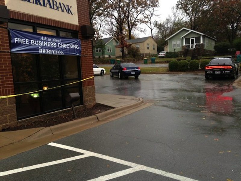 The Little Rock Police Department responds to a bank robbery Tuesday, Nov. 17, 2015, at the 4900 block of West Markham Street.
