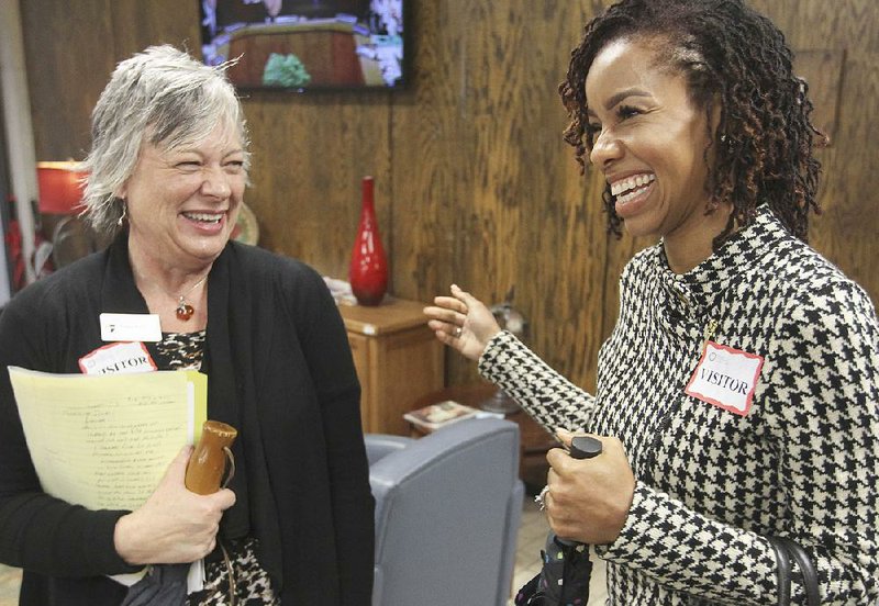 Maumelle Charter Elementary School Principal Diane Gross (left) and High School Principal Kimberly Willis smile after the state Charter Authorizing Panel approved Academics Plus Charter School Inc.’s request to operate a campus in Scott. 