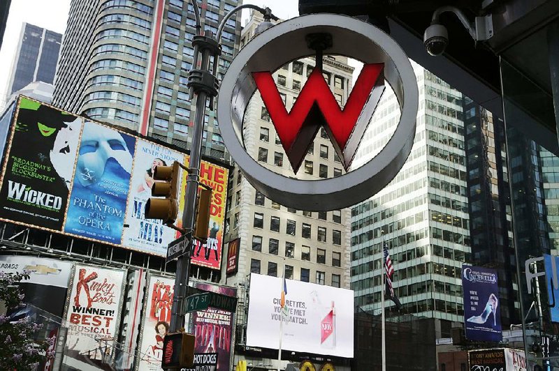 The logo for a W Hotel, owned by Starwood Hotels & Resorts Worldwide, is displayed in New York’s Time Square in this file photo. 