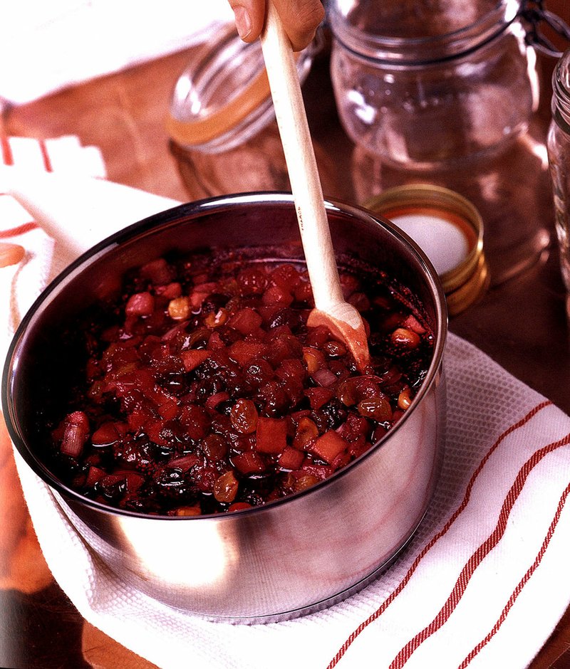 Cranberry Pomegranate Sauce With Satsumas starts on the stove, cooking the cranberries until they just begin to pop.