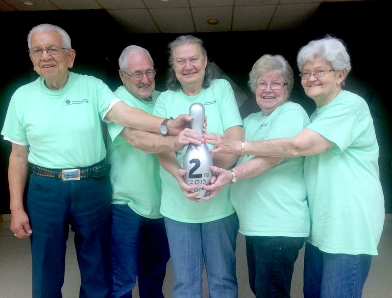 Photo submitted The Siloam Springs Senior Activity and Wellness Center won second place out of 11 other senior center teams at the Area Agency on Aging Region 1 Wii Bowling Tournament, held Nov. 5 at the Springdale Activity and Wellness Center. Pictured, from left, are Siloam Springs team members Rusty Phillips, Richard Borcherts, Connie Rickerson, Glenda Henderson and Beverly Davis.