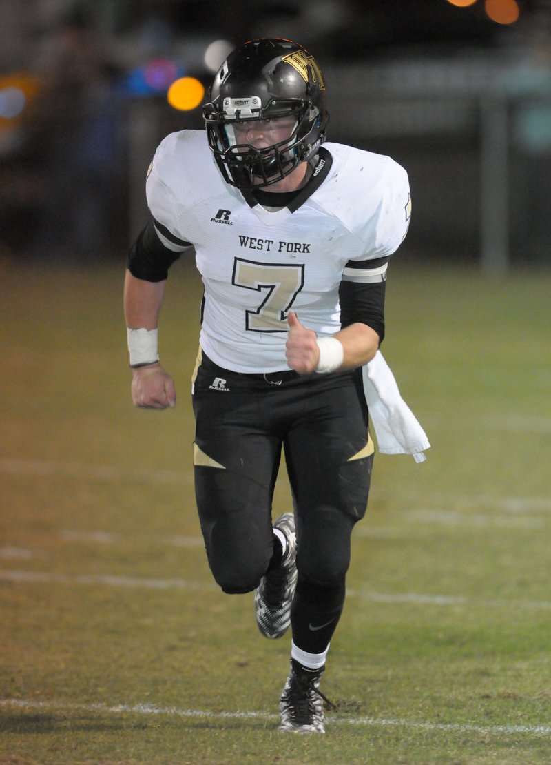 Briant Bowerman (7) of West Fork runs a route Nov. 6 during the first half at Jonathan Ramey Memorial Stadium in Greenland.