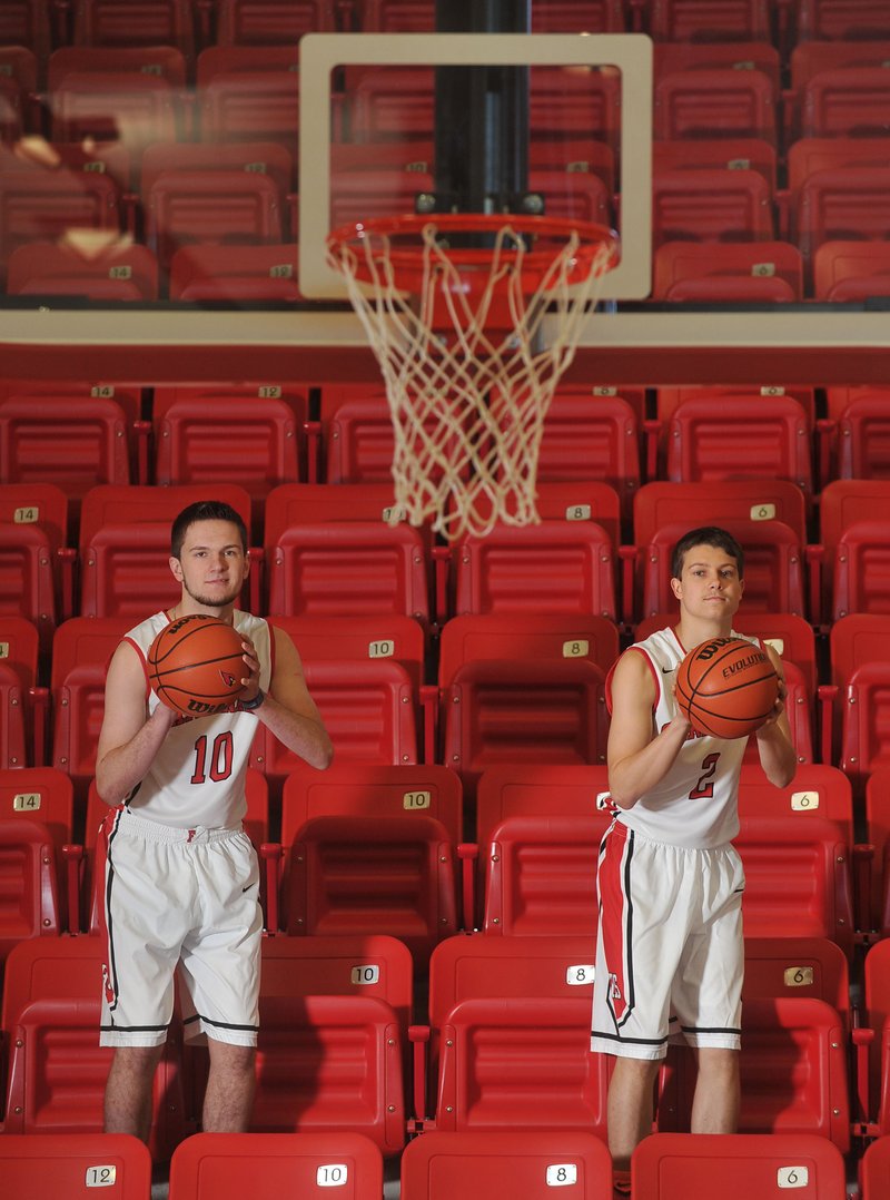 NWA Democrat-Gazette/MICHAEL WOODS Farmington basketball players Matt Thomas (left) and Matt Wilson have played together since the fourth grade, and the Cardinals are banking on that chemistry paying off this season.