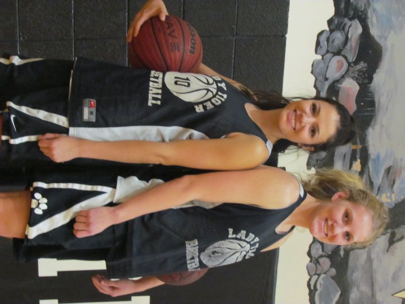 NWA Democrat-Gazette/RICK FIRES Taylor Doss (left) and Ashley Cox are top defenders returning for a Prairie Grove team that brings back five starters after reaching the semifinals of the Class 4A state playoffs last season.