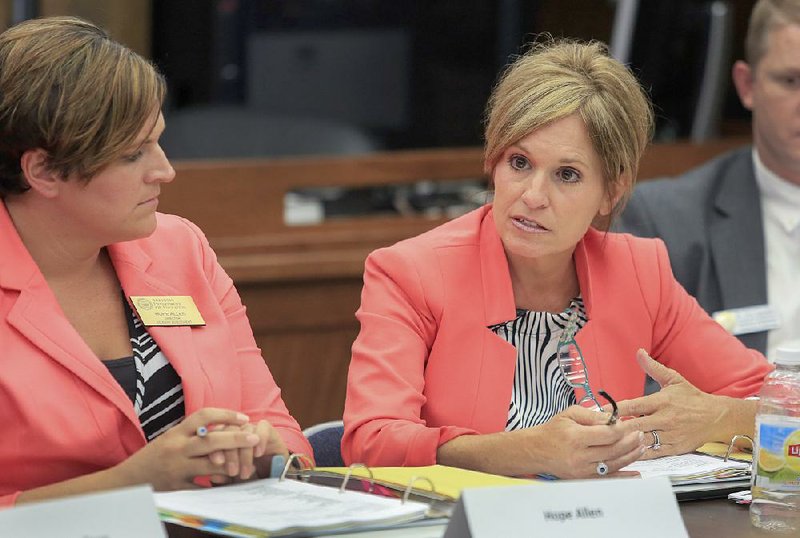 Debbie Jones (right), the state Department of Education’s assistant commissioner for learning services, is shown in this file photo.
