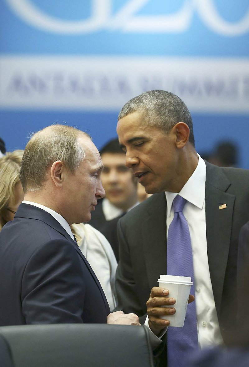 Russian President Vladimir Putin and President Barack Obama talk Monday at the Group of 20 summit in Antalya, Turkey. 