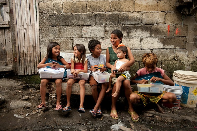 Samaritan’s Purse will collect school supplies, hygiene items and toys for their Operation Christmas Child project until Monday. The donations are packed into containers the size of a shoebox and delivered to needy children in other countries. Above is a group of children opening such boxes in the Phillipines.
