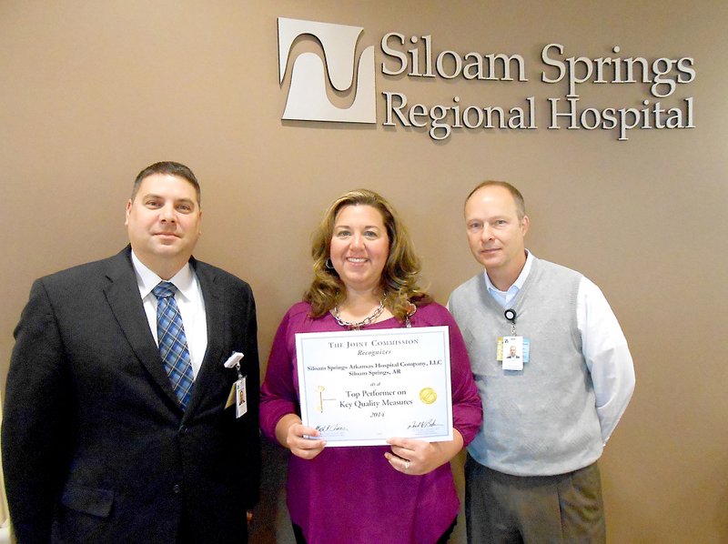 Submitted Photo
Patrick Kerrwood, Siloam Springs Regional Hospital chief executive officer (left), Maria Wleklinski, RN, SSRH chief nursing officer, and Todd Williams, SSRH chief financial officer, show the "Top Performer" certificate earned by the hospital on Tuesday.