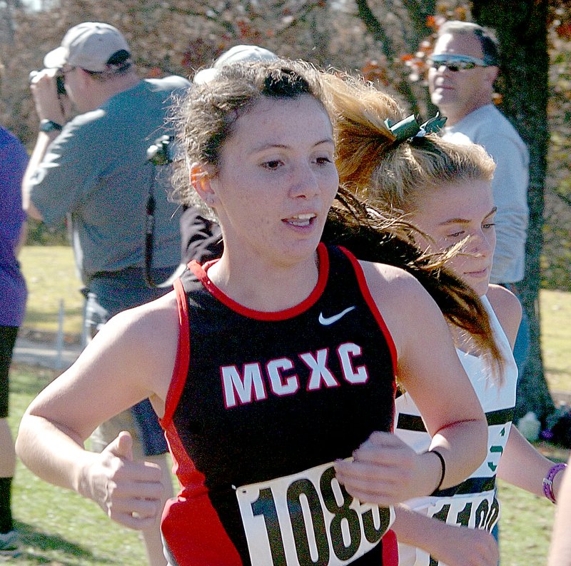 Photo by Rick Peck McDonald County High School&#x2019;s Emily High, shown running at the Class 4 state championships, was recently named as one of eight first-team members of the SWCCCA 2015 All-Area Cross Country Team. There are 19 Class 4 teams in the area.