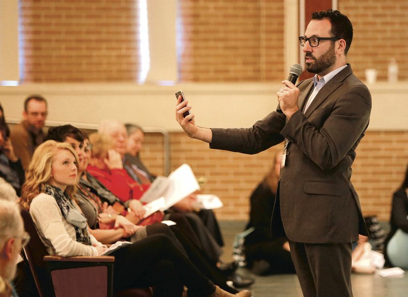 Danny M. Cohen, author and researcher on the Holocaust, speaks Nov. 6 during the 24th annual Holocaust Conference at The Jones Center in Springdale. Cohen shared with high school students a scene from his book Train, that takes place in Berlin during German occupation of the town. He pulled out his smartphone to show students the reaction most would have in 2015 — they’d record it on their smartphones, he said.