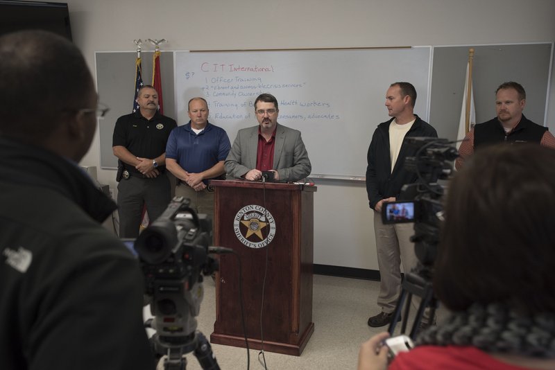 Benton County Sheriff Kelley Cradduck (center) makes a statement to the media Wednesday. Standing with Cradduck are Lt. Harold Gage (from left), Lt. Greg Stevenson, Chief Richie Conner and Capt. Kenneth Paul.