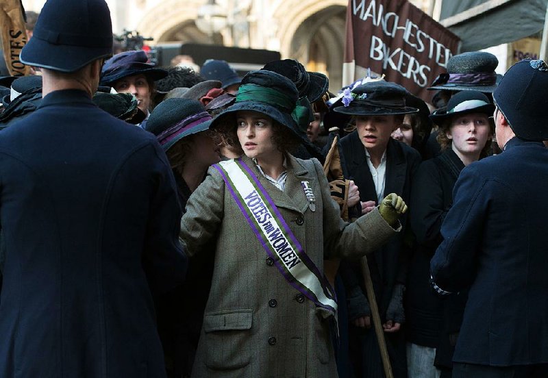 Helena Bonham Carter (left) stars as Edith Ellyn in director Sarah Gavron’s Suffragette, a fact-based story written by Abi Morgan.
