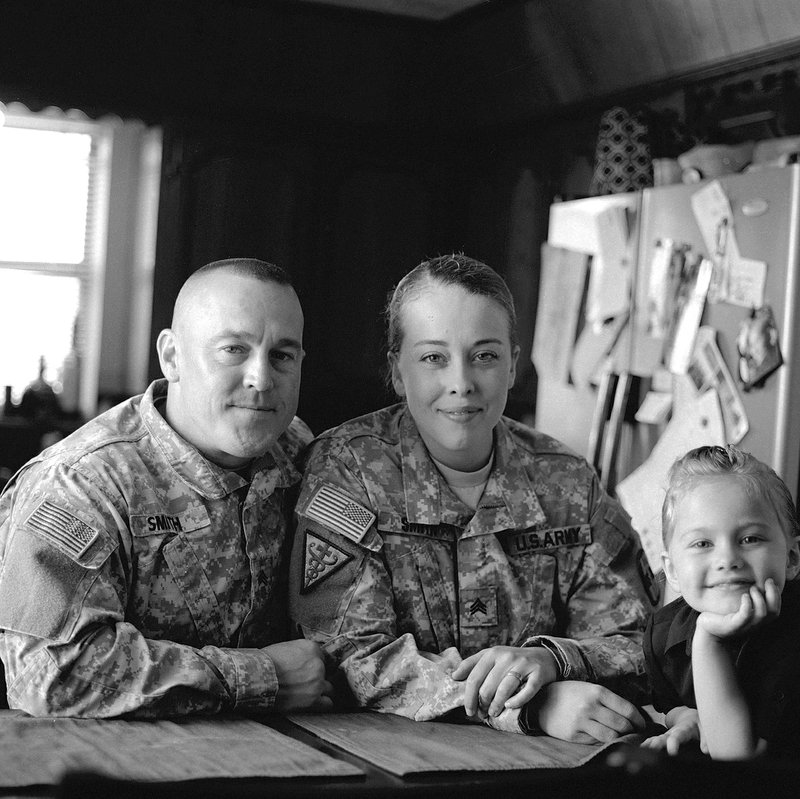 "Quanah, Meghan and Teaghan Smith, Snyder, Oklahoma" is a portrait taken in the Wichita Mountains by Don House.