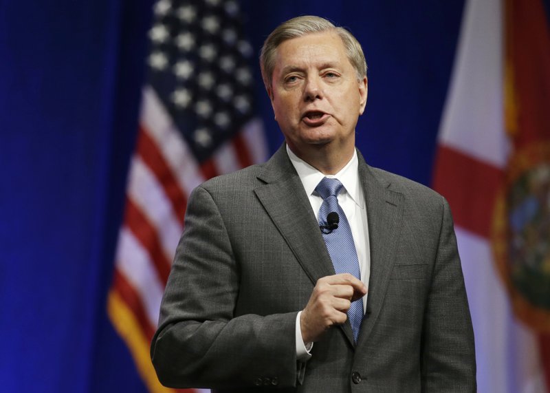  In this Nov. 13, 2015 file photo, Republican presidential candidate, Sen. Lindsey Graham, R-S.C. speaks in Orlando, Fla. The Paris attacks have given new impetus to a bipartisan push to approve new war powers to fight Islamic State militants while also underscoring the unwillingness of many in Congress to cast the first war vote in 13 years. Graham said Nov. 18, that he plans to introduce, after the Thanksgiving recess, a new Authorization for the Use of Military Force, or AUMF, against IS militants responsible for last weeks bombings that killed 129 in Paris. 