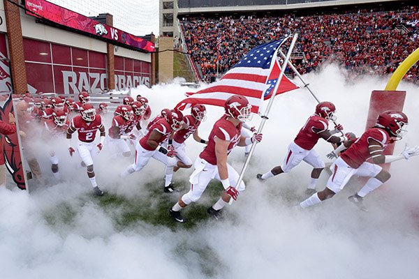 Arkansas players run on to the field prior to a game against Auburn on Saturday, Oct. 24, 2015, at Razorback Stadium in Fayetteville. 
