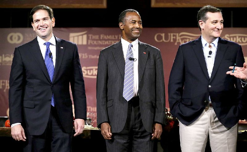 Republican presidential candidates (from left) Marco Rubio, Ben Carson and Ted Cruz share the stage during Friday’s Presidential Family Forum in Des Moines, Iowa.