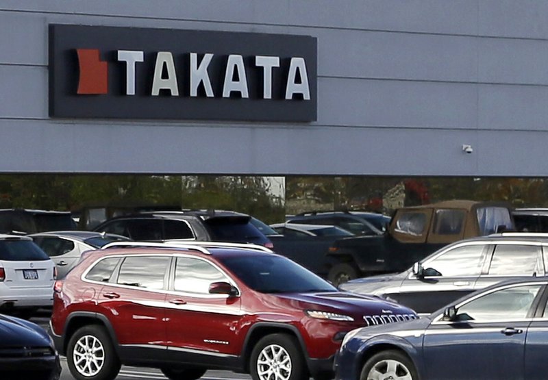 This Oct. 22, 2014, file photo, shows the North American headquarters of automotive parts supplier Takata in Auburn Hills, Mich. 
