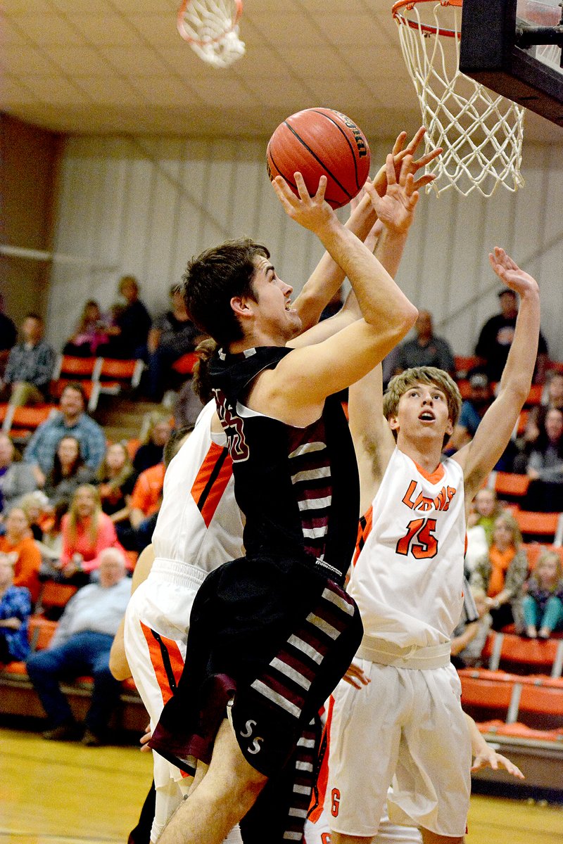 Bud Sullins/Special to Siloam Sunday Siloam Springs senior Carlson Wakefield goes up strong to the basket against Gravette on Thursday in the Panthers&#8217; 66-40 win. Wakefield scored eight points in the win.